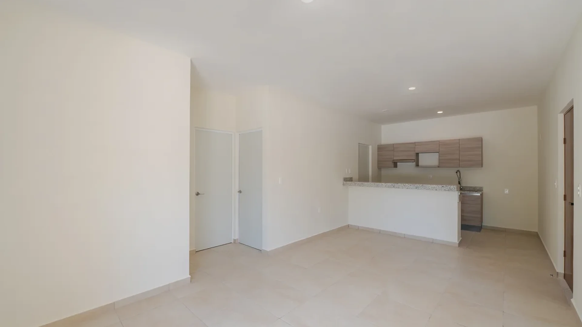 View of Open Concept Living at Selva Escondida II, showcasing Unfurnished Apartment, Tiled Flooring.