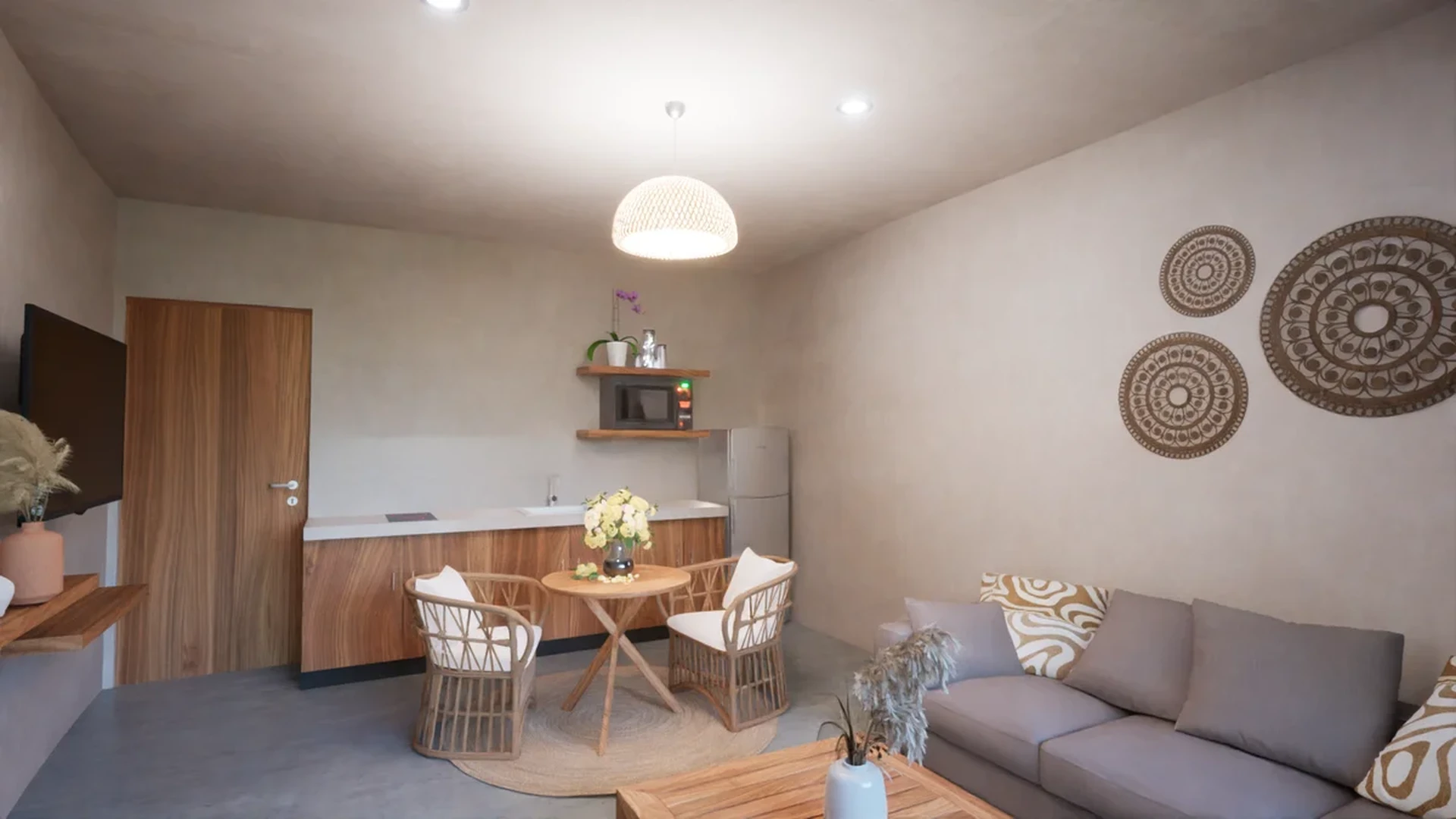 View of Living Room at TsOn, showcasing Kitchenette, Open Concept Living.