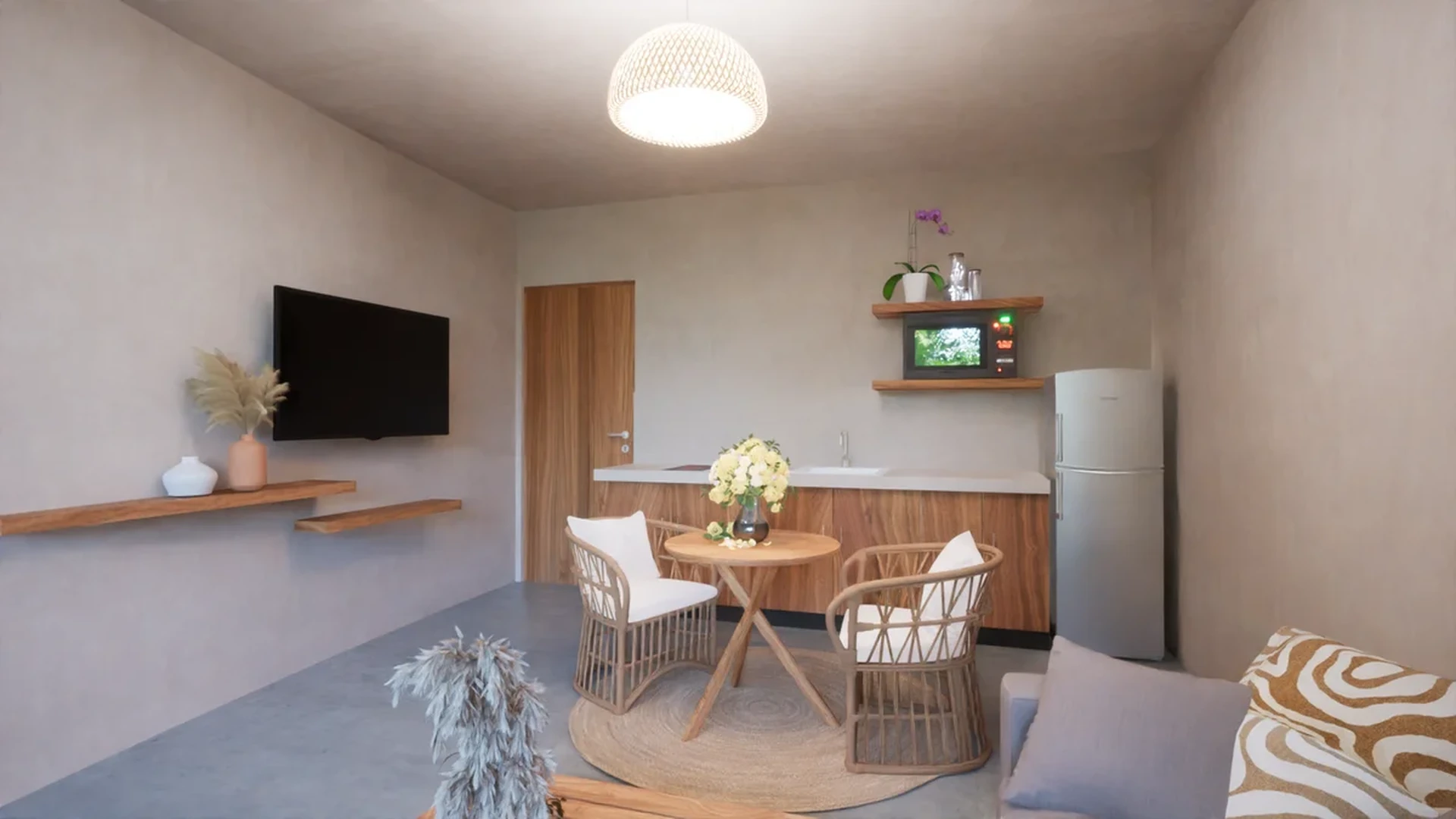 View of Studio Apartment at TsOn, showcasing Modern Kitchenette, Minimalist Design.