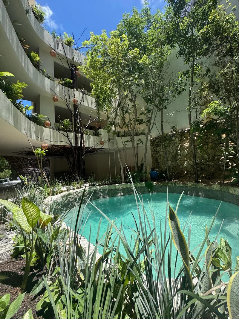 Image of Swimming Pool at TsOn, featuring Swimming Pool, Lush Landscaping.