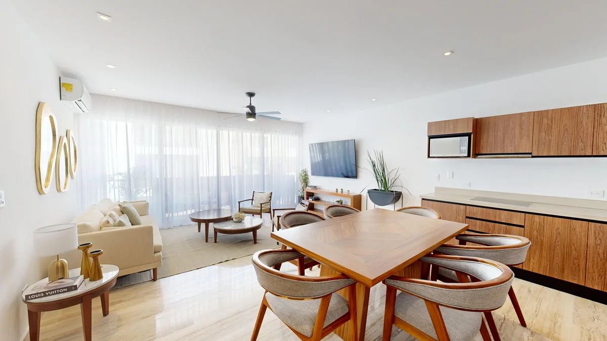 View of Open Concept Living at Ceiba at 25, showcasing Modern Apartment, Dining Area.