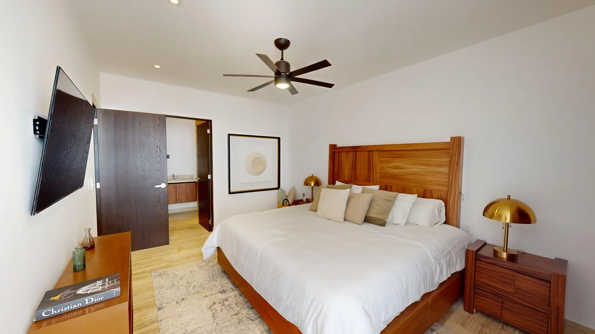 View of Master Bedroom at Ceiba at 25, showcasing En-suite Bathroom, Modern Decor.
