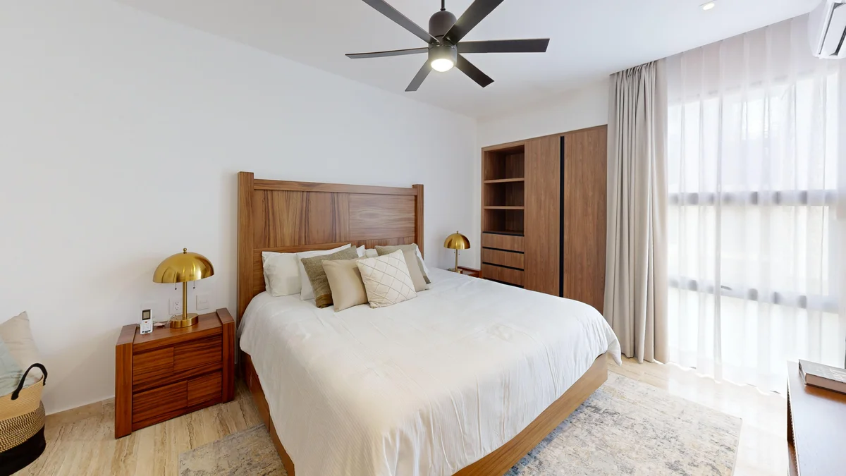 View of Bedroom at Ceiba at 25, showcasing Modern Design, Wood Furniture.