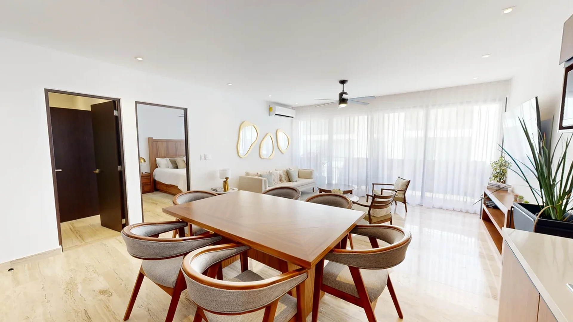 View of Open Plan Living at Ceiba at 25, showcasing Dining Room, Modern Interior.