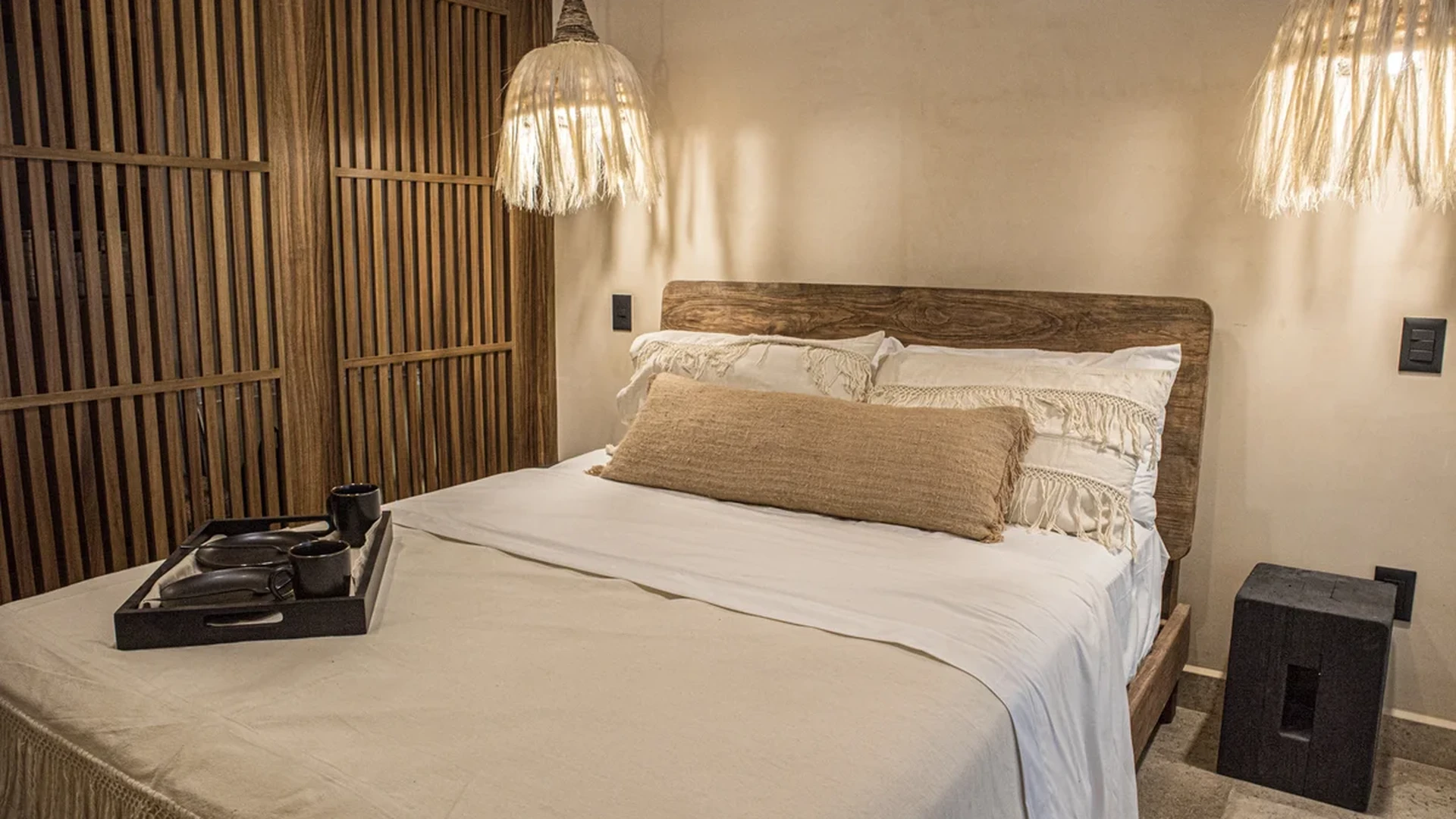 View of Bedroom at Le Reve Cenote, showcasing Rustic Decor, Bohemian Style.