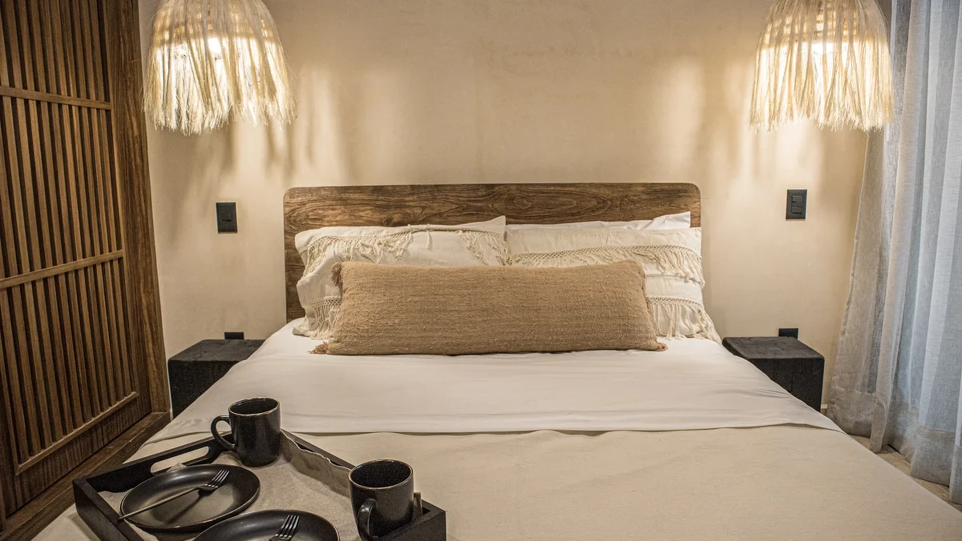 View of Bedroom at Le Reve Cenote, showcasing Bohemian Decor, Rustic Design.