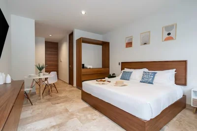 View of Bedroom at Akua Reserve, showcasing Studio Apartment, Modern Decor.