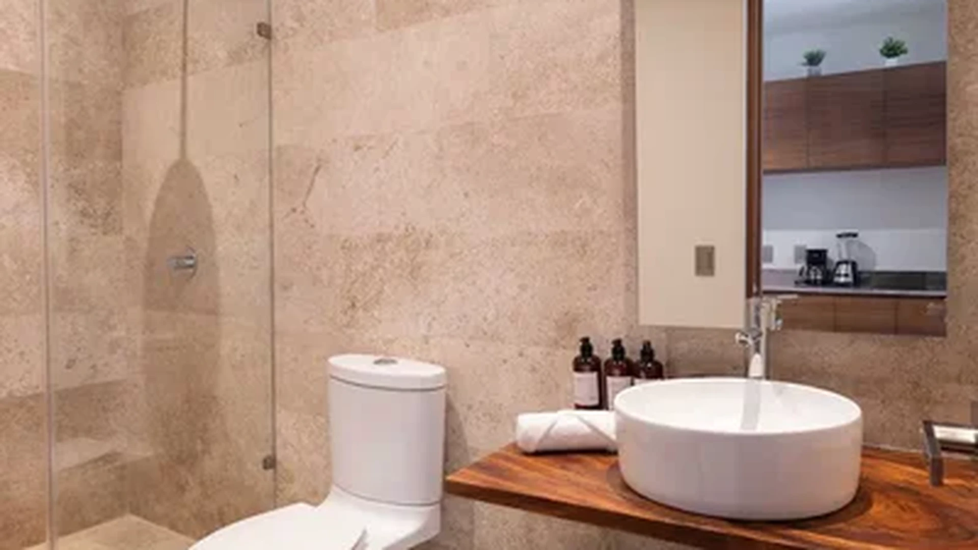 View of Modern Bathroom at Akua Reserve, showcasing Walk-in Shower, Vessel Sink.