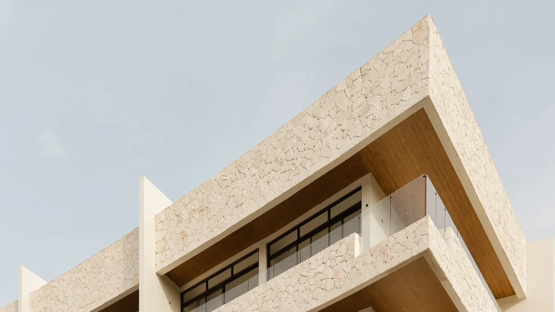 View of Modern Architecture at Distrito Norte, showcasing Building Exterior, Stone Facade.