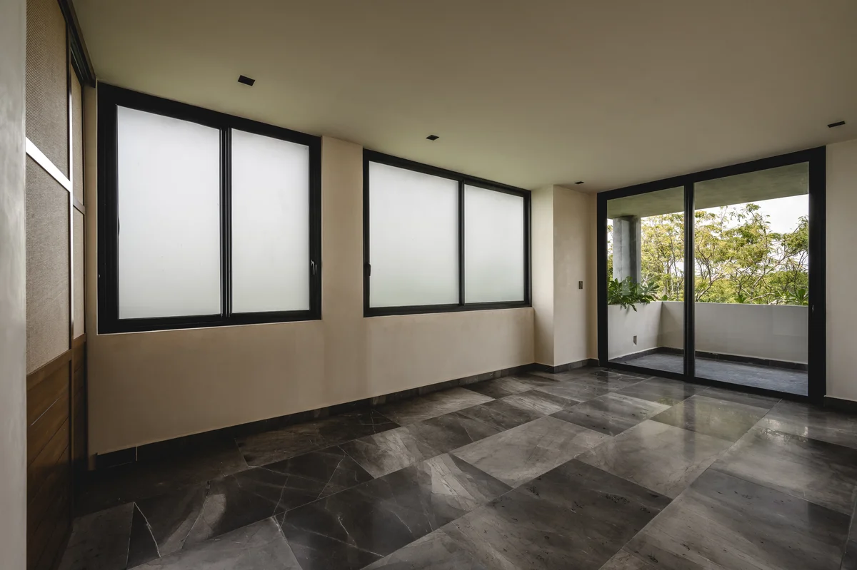 View of Unfurnished Room at Humana, showcasing Marble Flooring, Modern Interior.