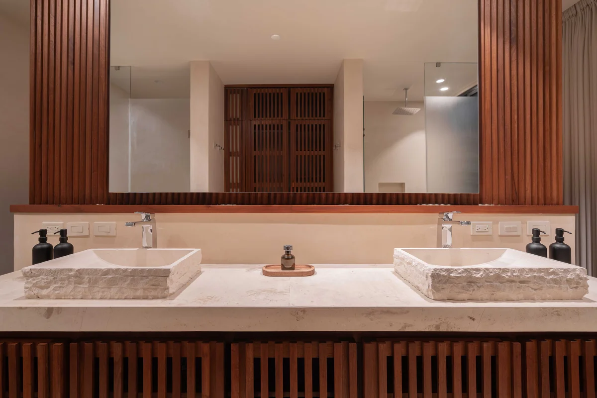 View of Modern Bathroom at Miraluna, showcasing Double Vanity, Stone Sinks.