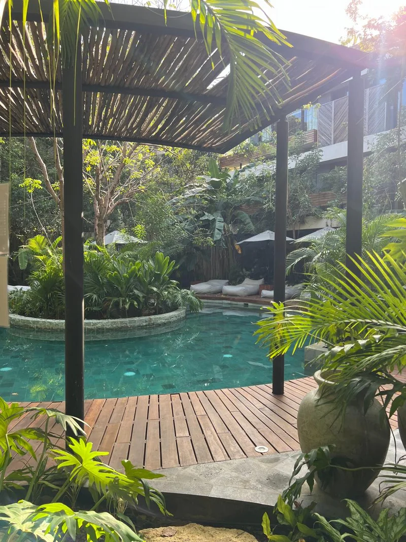 Image of Swimming Pool at Miraluna, featuring Resort Style Pool, Tropical Oasis.