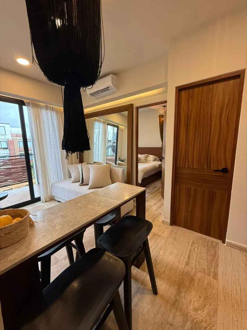 View of Modern Apartment at Naia Naay, showcasing Open Concept, Breakfast Bar.