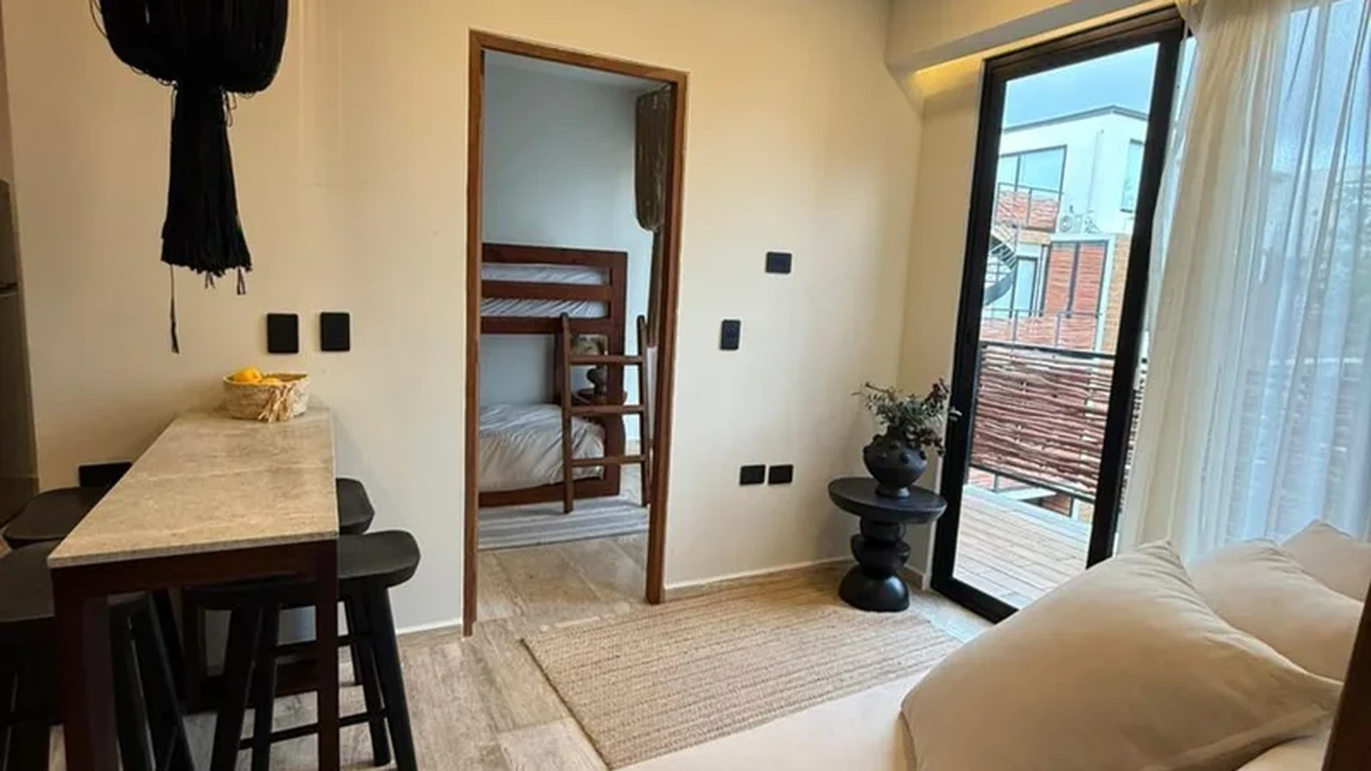 View of Living Room at Naia Naay, showcasing Modern Decor, Breakfast Bar.