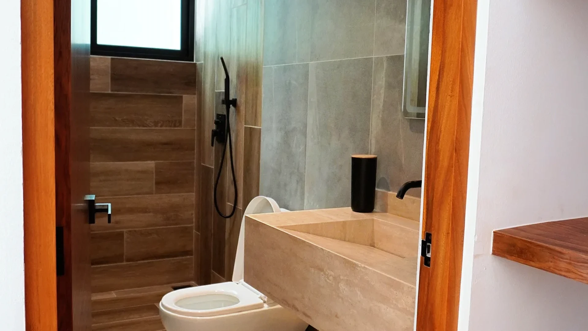 View of Modern Bathroom at Baikal, showcasing Walk-in Shower, Stone Vanity.