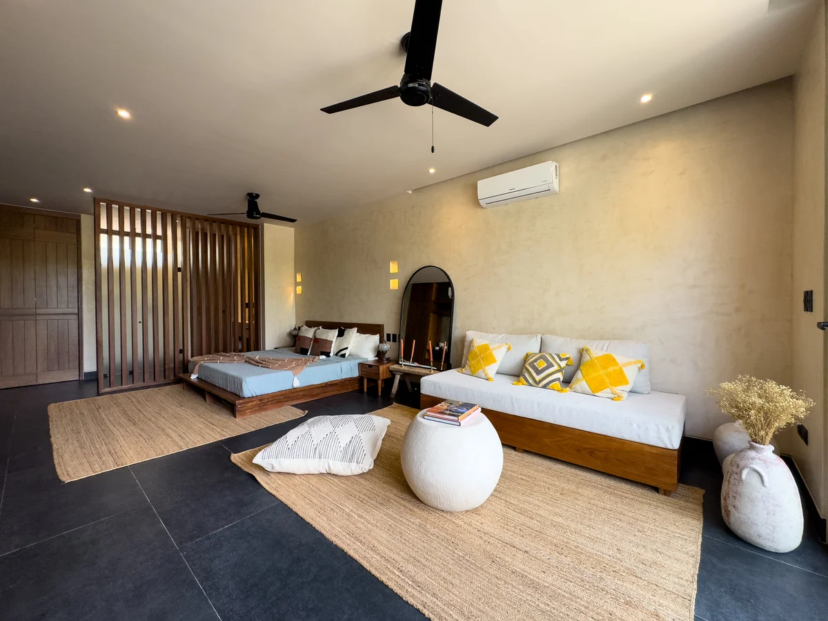 View of Modern Bedroom at Mestiza 15, showcasing Spacious Layout, Studio Apartment.