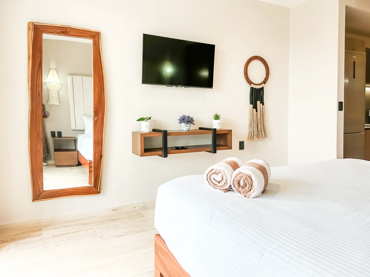 View of Bedroom at Tuk Hacienda, showcasing Modern Decor, Tiled Flooring.