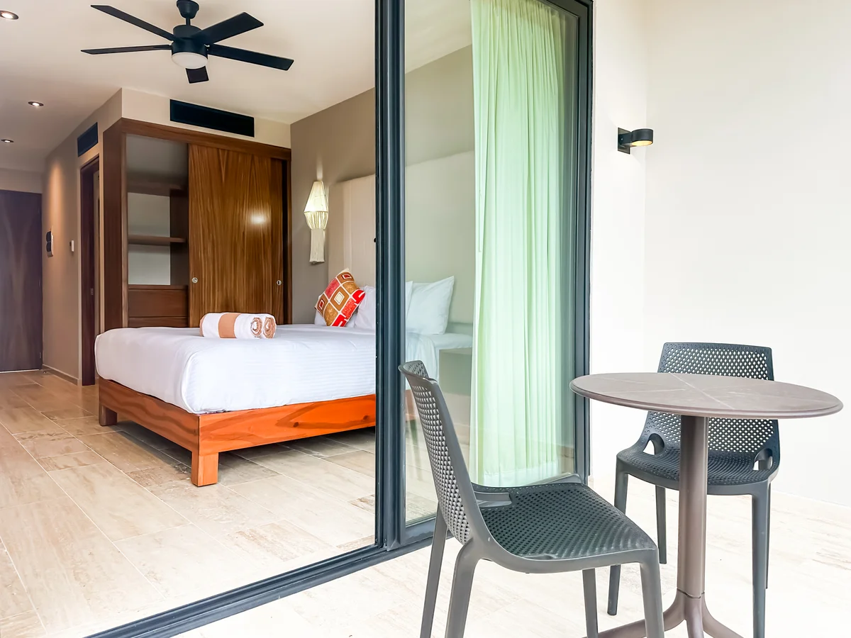 View of Bedroom at Tuk Hacienda, showcasing Balcony, Private Patio.