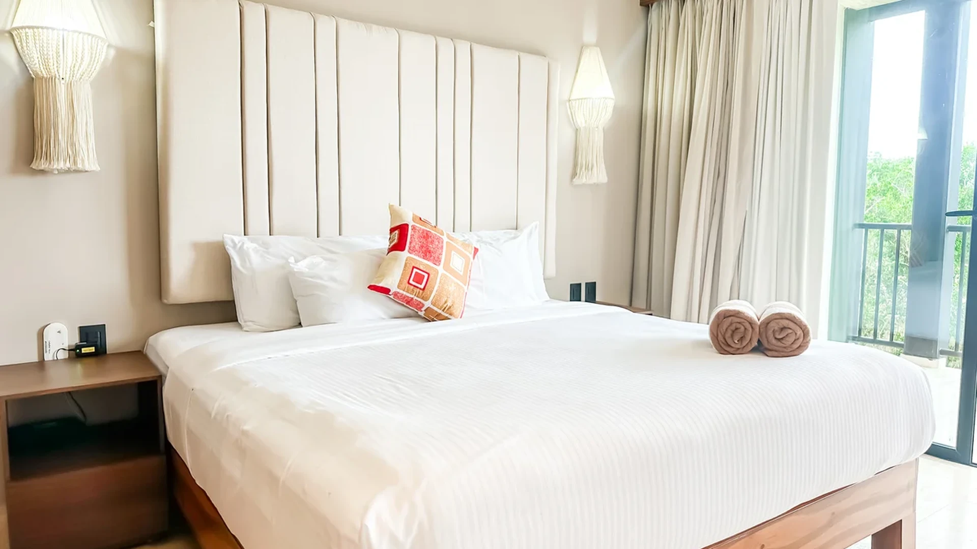 View of Bedroom at Tuk Hacienda, showcasing King Size Bed, Upholstered Headboard.