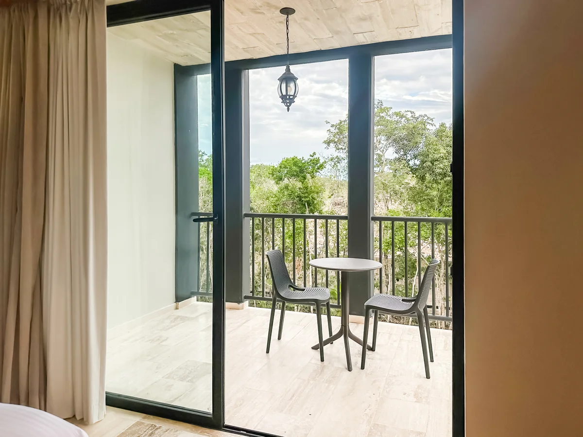 View of Private Balcony at Tuk Hacienda, showcasing Nature View, Indoor-Outdoor Living.
