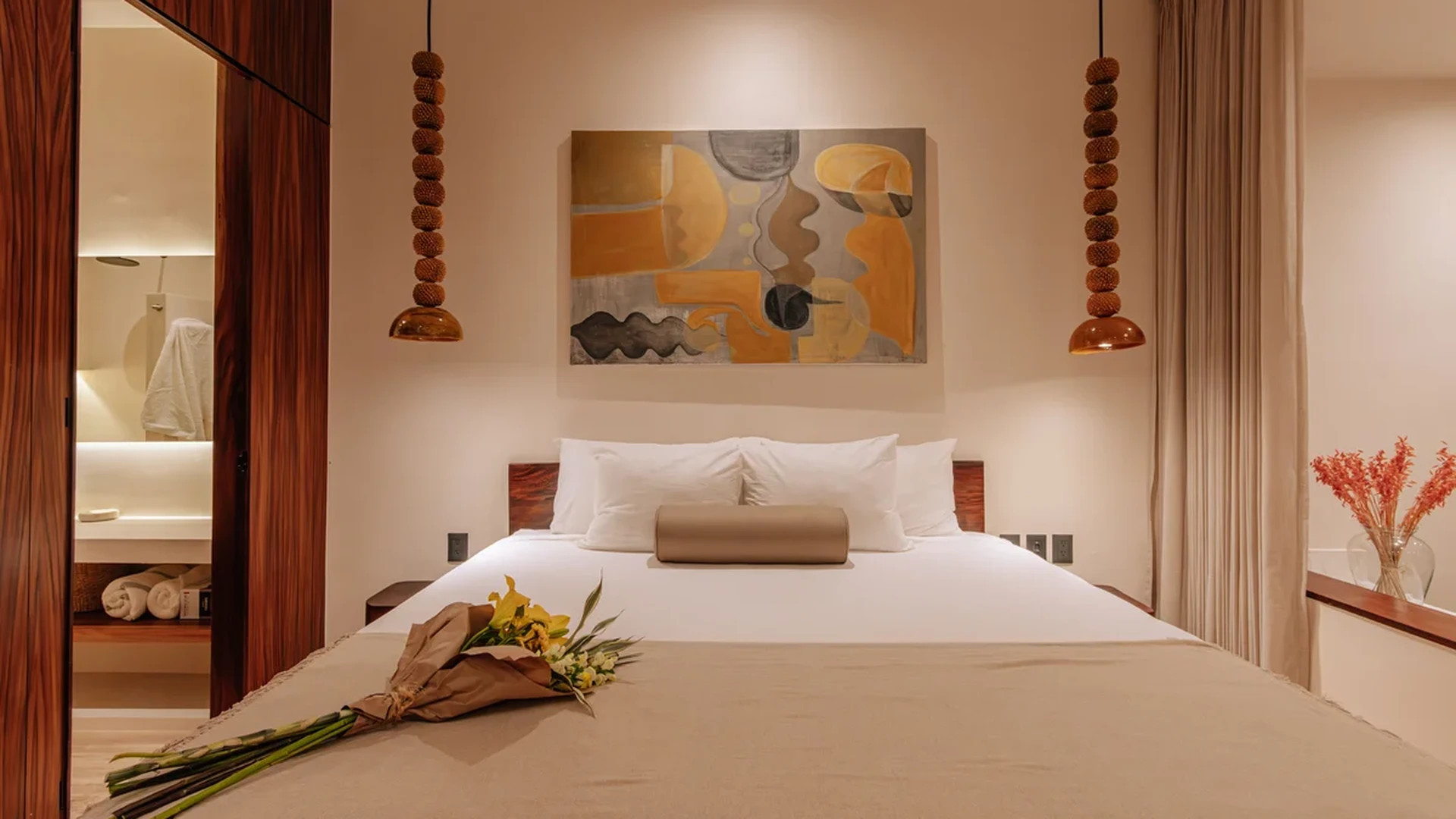 View of Luxury Bedroom at Bacab, showcasing Modern Interior Design, Wood Paneling.