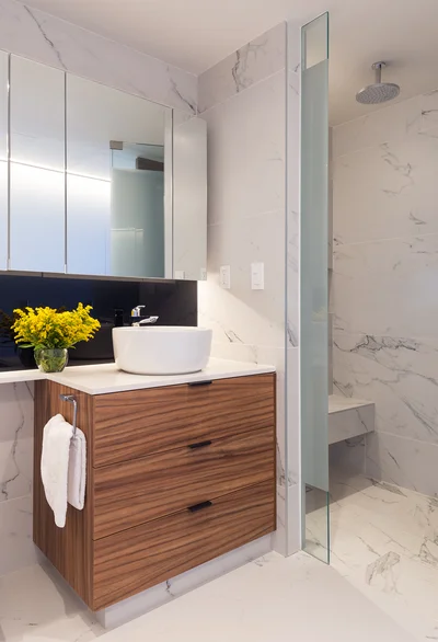 View of Modern Bathroom at Woha, showcasing Marble Tiling, Walk-in Shower.