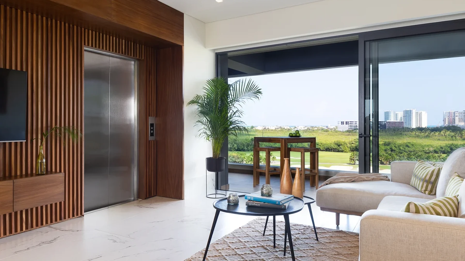 View of Luxury Living Room at Woha, showcasing Private Elevator, Modern Interior.