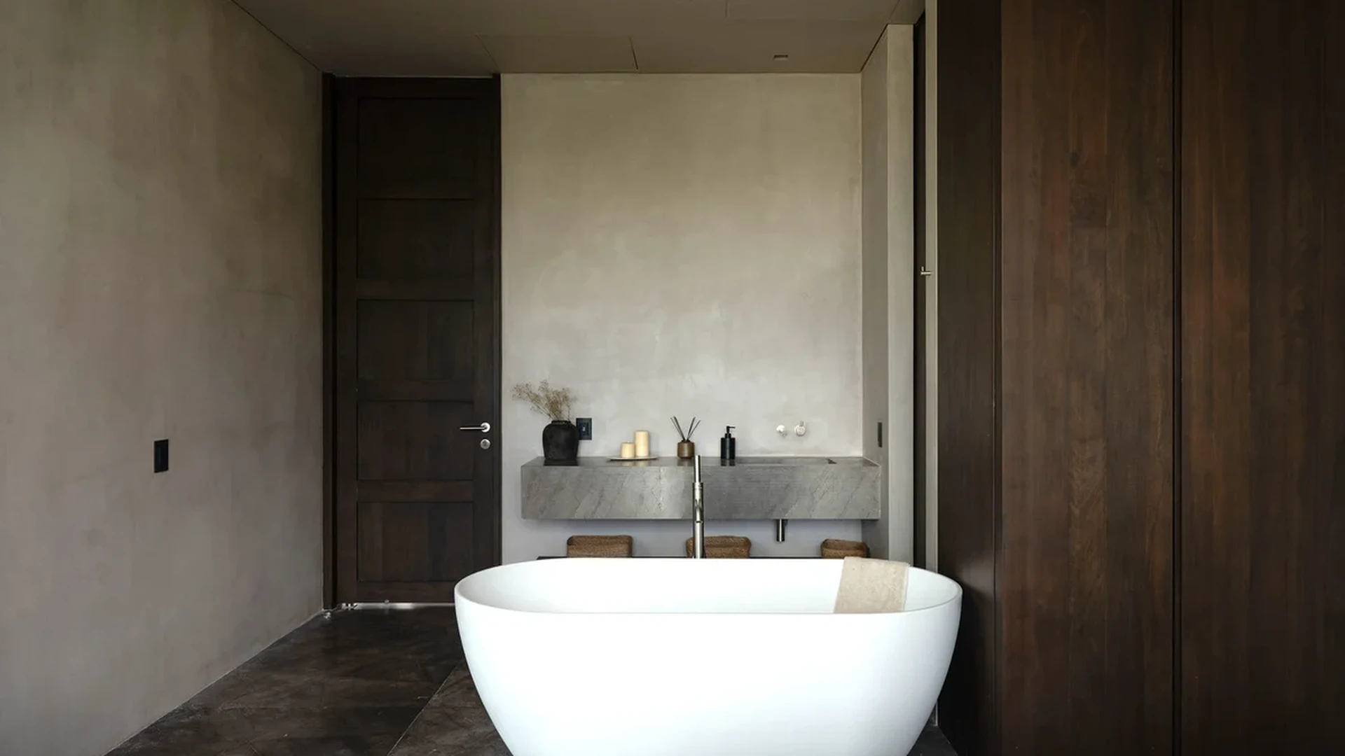 View of Modern Bathroom at La Reserva, showcasing Freestanding Bathtub, Double Vanity.