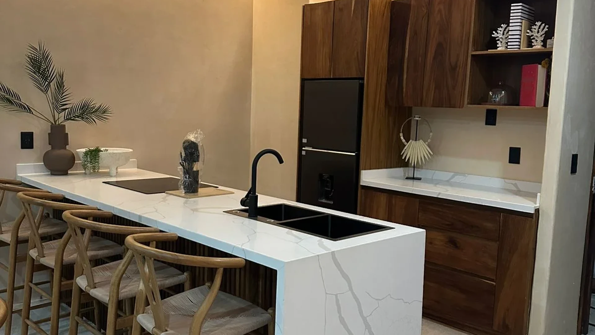 View of Modern Kitchen at Alux 33, showcasing Waterfall Island, Breakfast Bar.