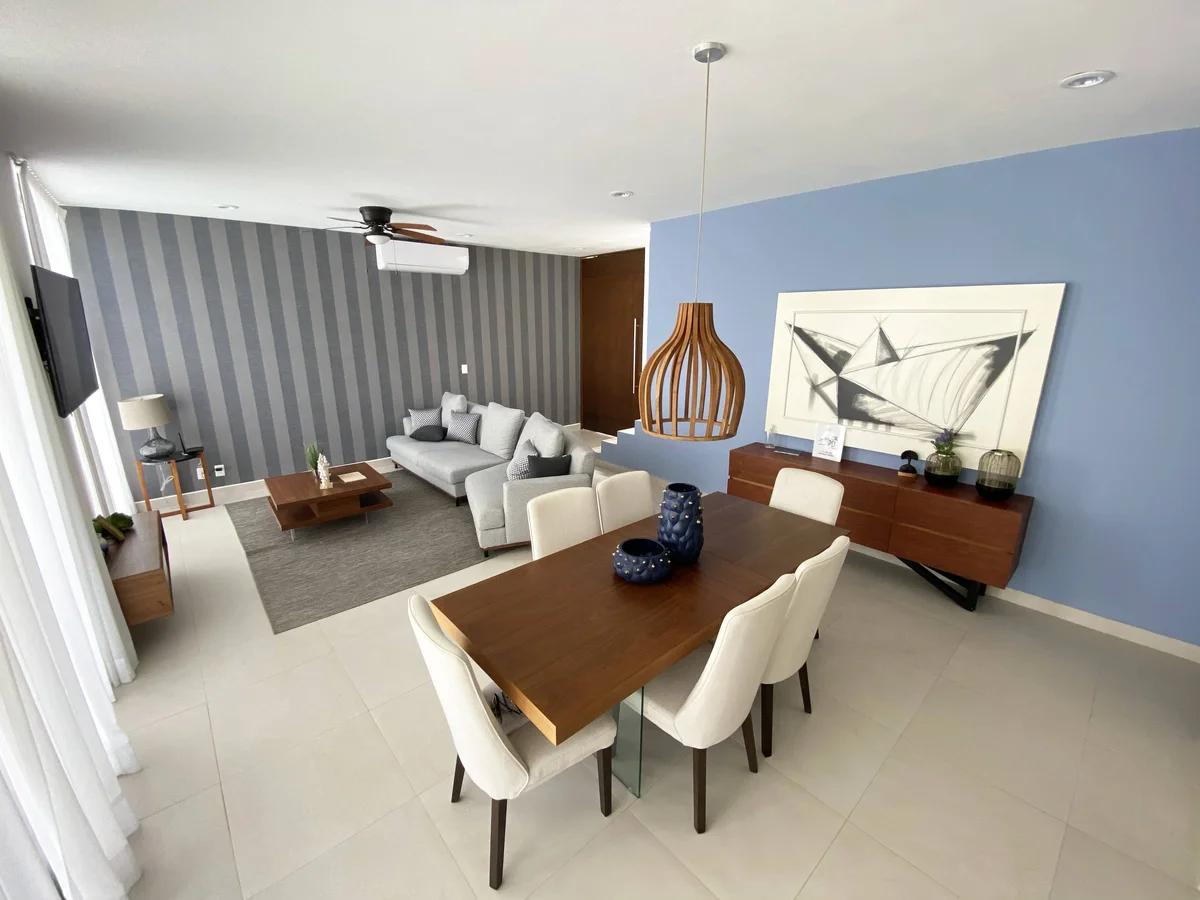 View of Open Concept Living at Palmara, showcasing Modern Dining Room, Contemporary Living Space.