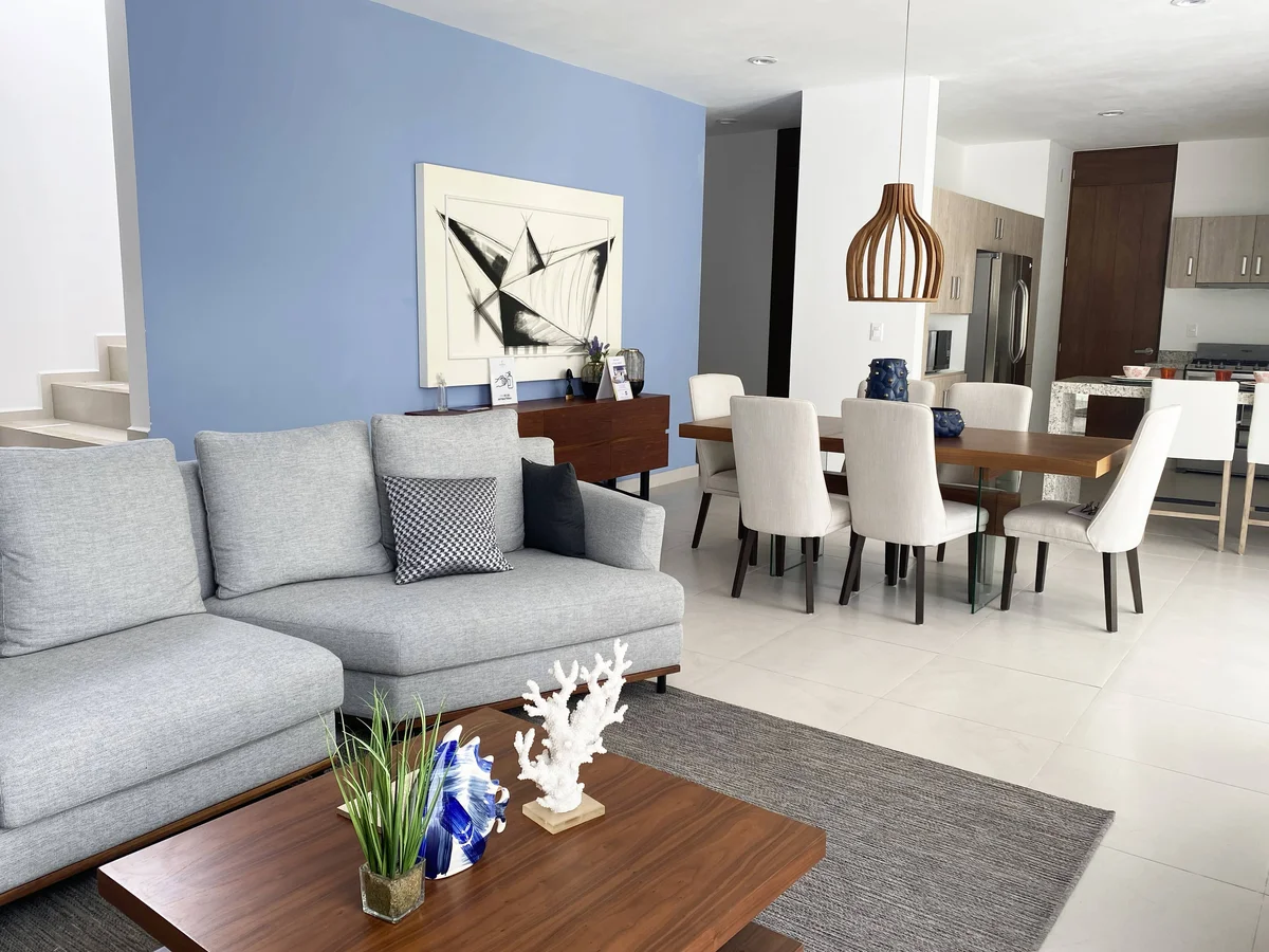 View of Open Concept Living at Palmara, showcasing Living and Dining Room, Modern Interior Design.