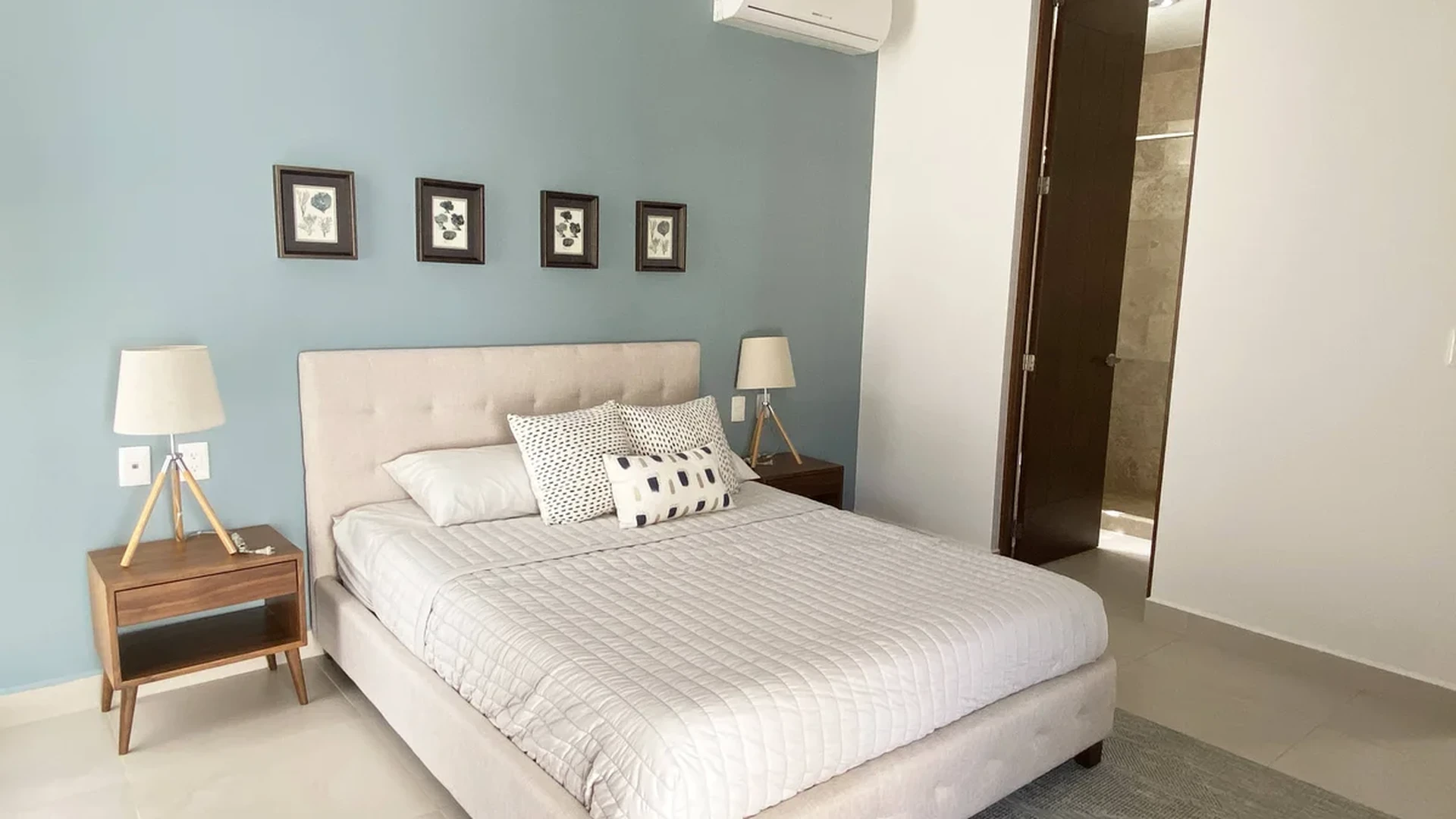 View of Modern Bedroom at Palmara, showcasing En-suite Bathroom, Tiled Flooring.