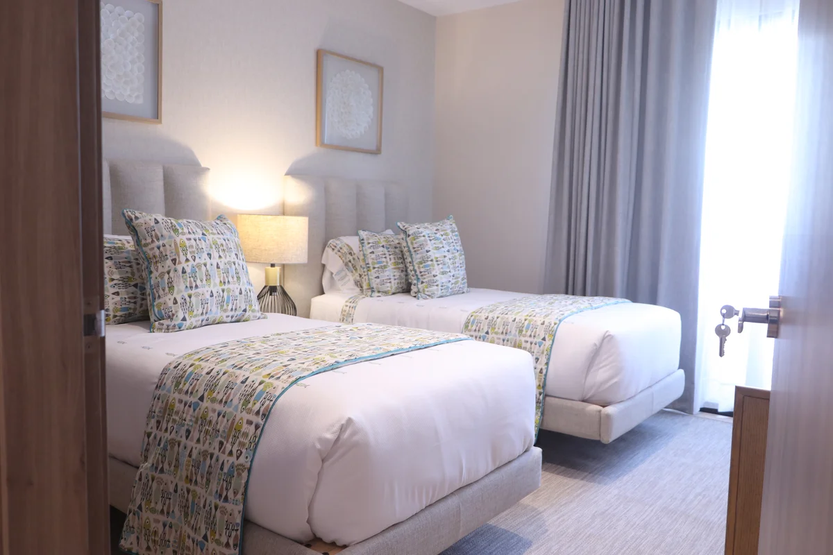 View of Bedroom at Hodela, showcasing Guest Room, Twin Beds.