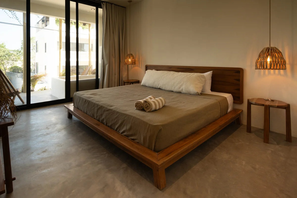 View of Bedroom at Gold Garden, showcasing Modern Bedroom, Wooden Bed Frame.