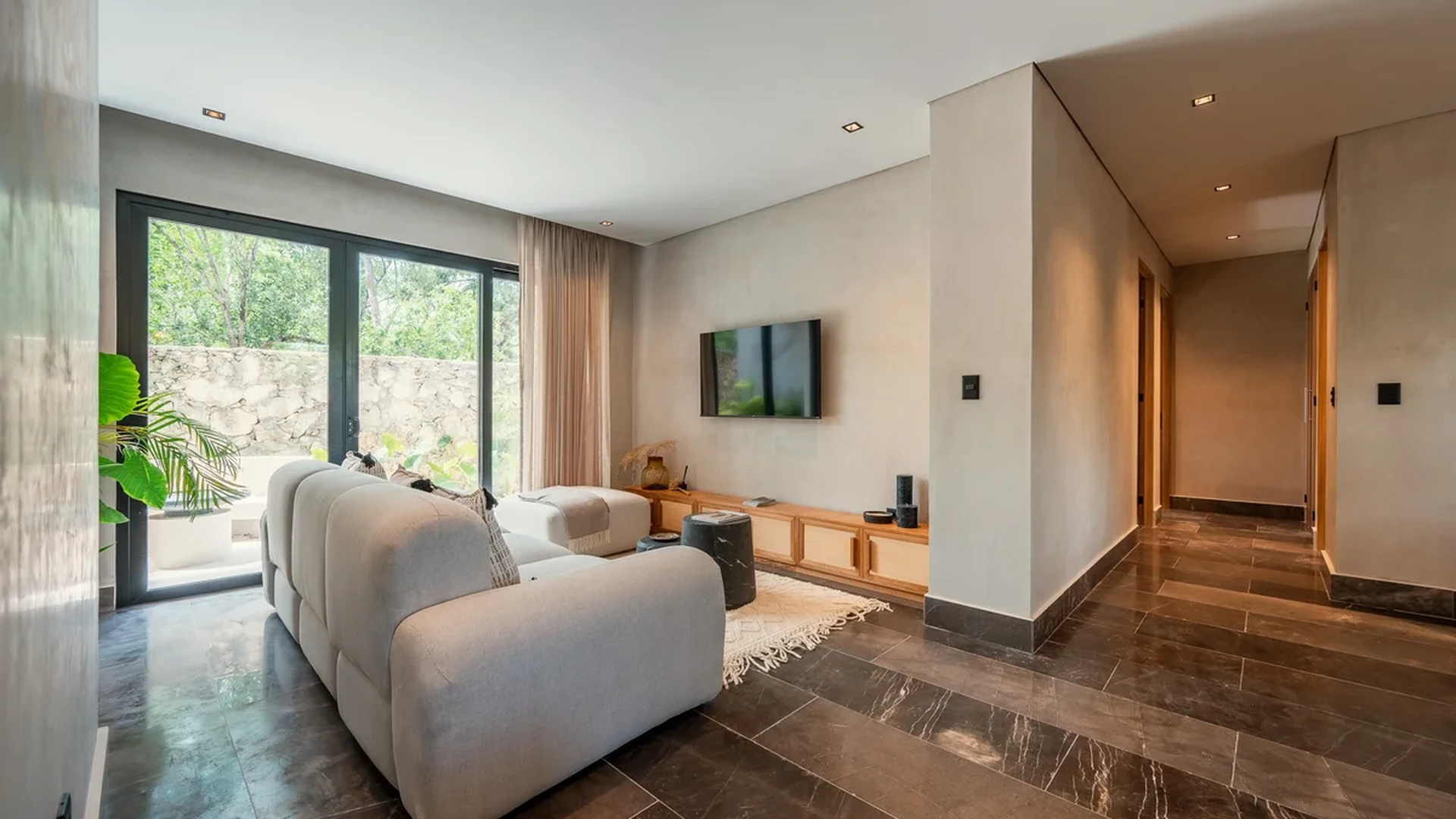 Image of Lounge at Xatum, featuring Modern Living Room, Marble Flooring.