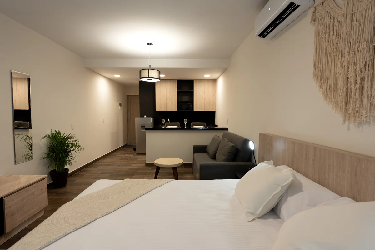 View of Studio Apartment at Wamai, showcasing Open Concept Living, Modern Interior.