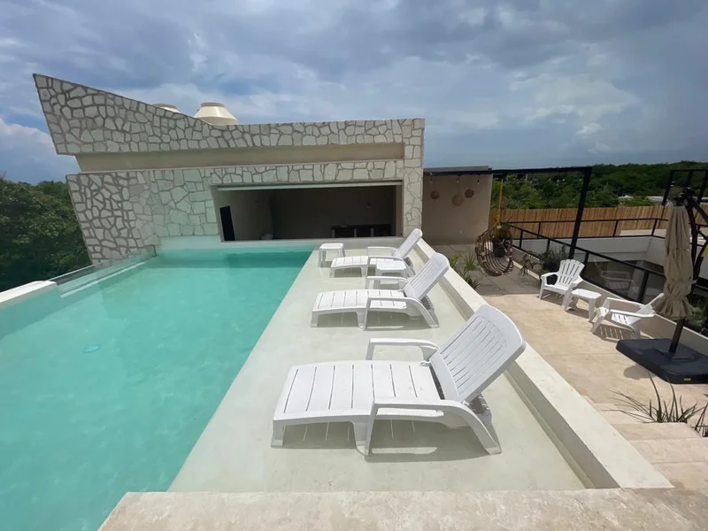 Image of Swimming Pool at Wamai, featuring Rooftop Pool, Sundeck.