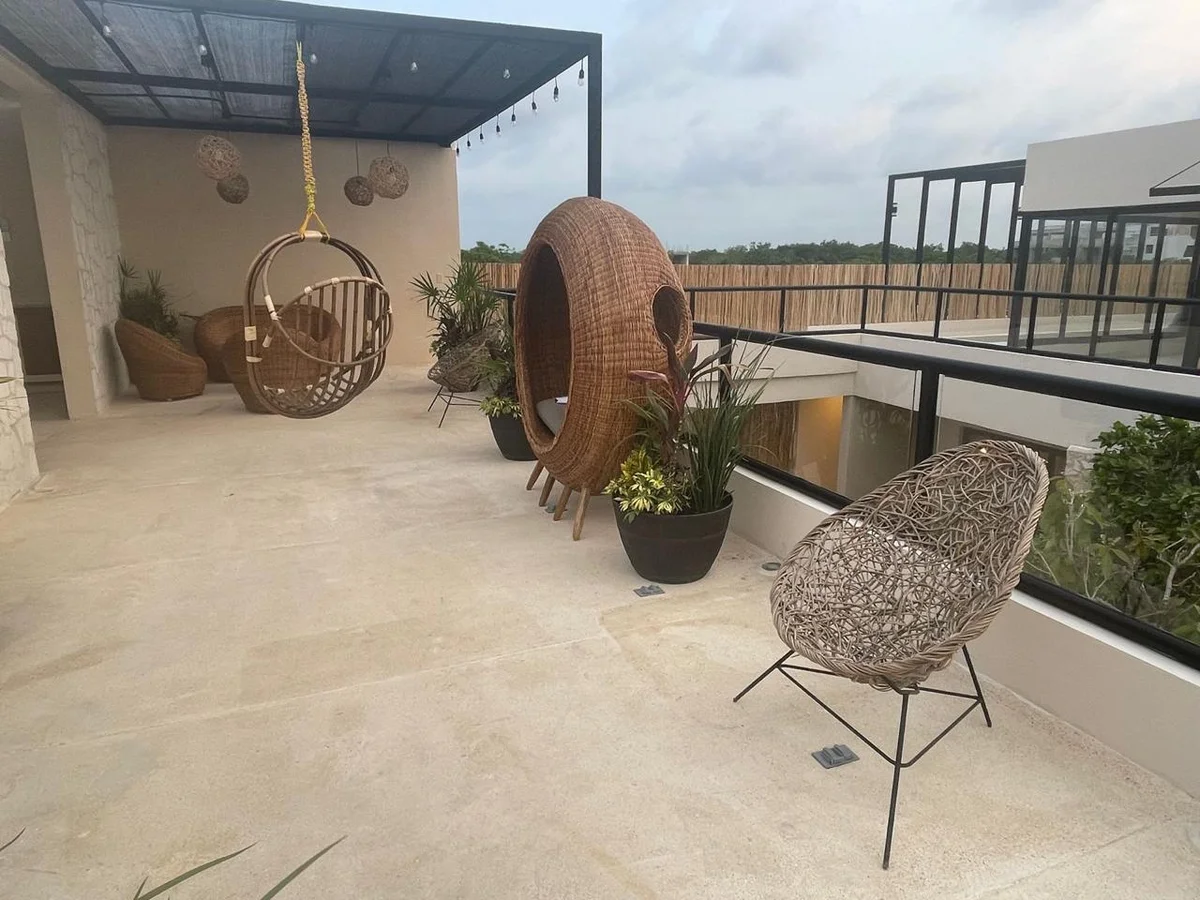 Image of Rooftop Terrace at Wamai, featuring Rooftop Terrace, Outdoor Lounge.