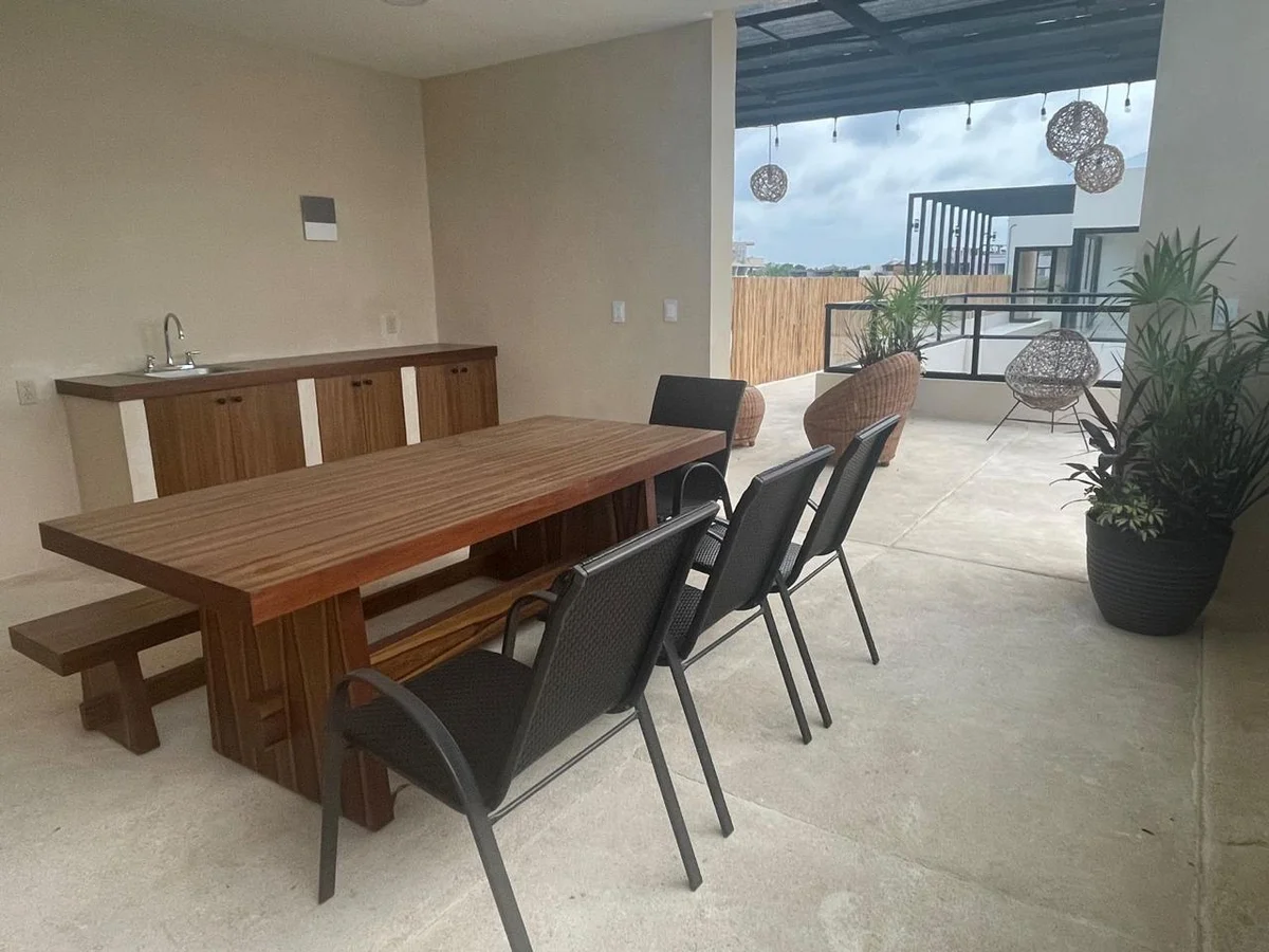 Image of Rooftop Terrace at Wamai, featuring Rooftop Terrace, Outdoor Dining.