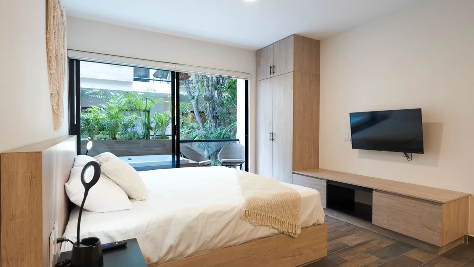 Image of Jacuzzi at Wamai, featuring Modern Bedroom, Private Balcony.