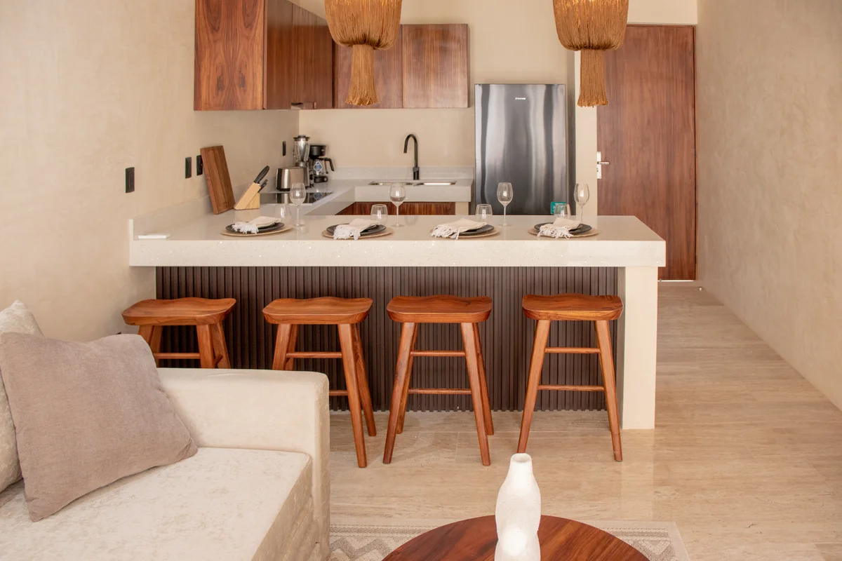 View of Modern Kitchenette at Loch, showcasing Breakfast Bar, Open Concept Living.