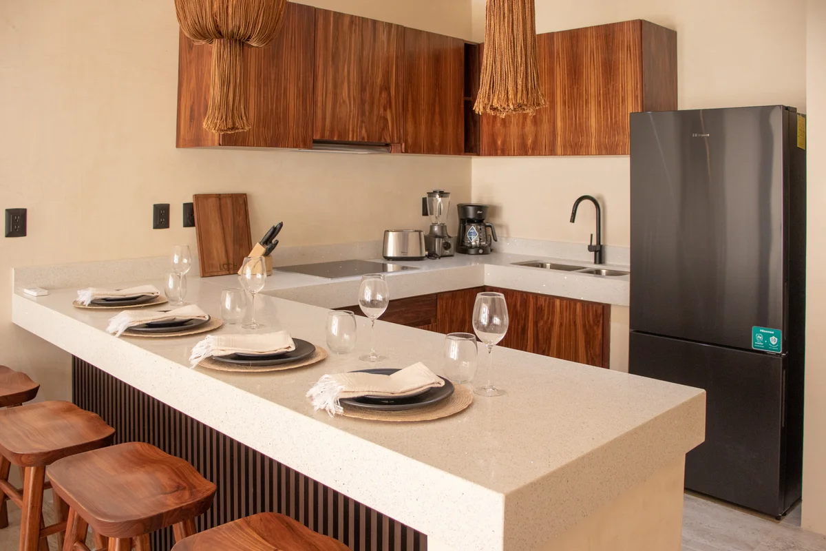 View of Modern Kitchen at Loch, showcasing Breakfast Bar, Wood Cabinetry.