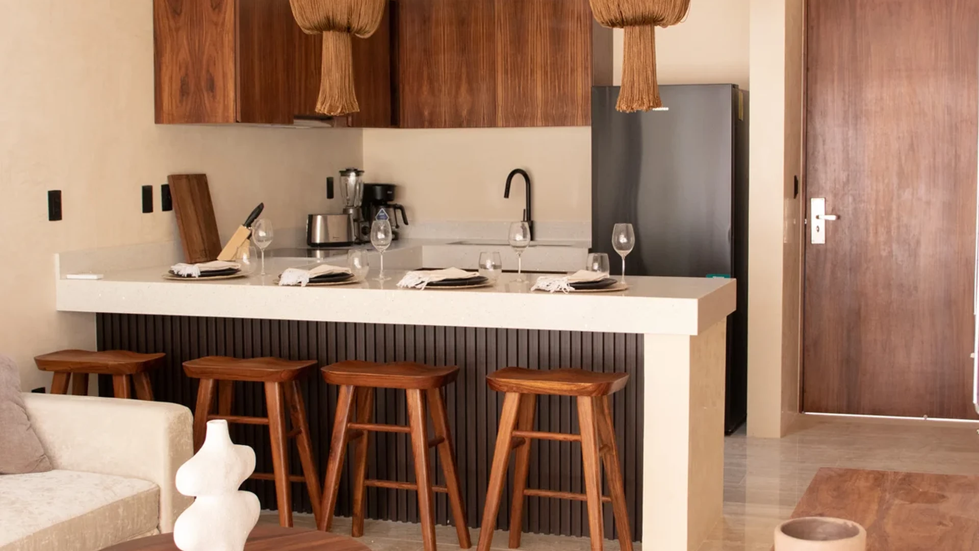 View of Open Concept Living at Loch, showcasing Modern Kitchen, Breakfast Bar.