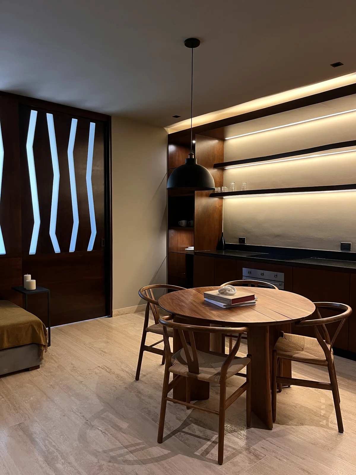 View of Modern Dining Room at Arthouse, showcasing Kitchenette, Wood Cabinetry.