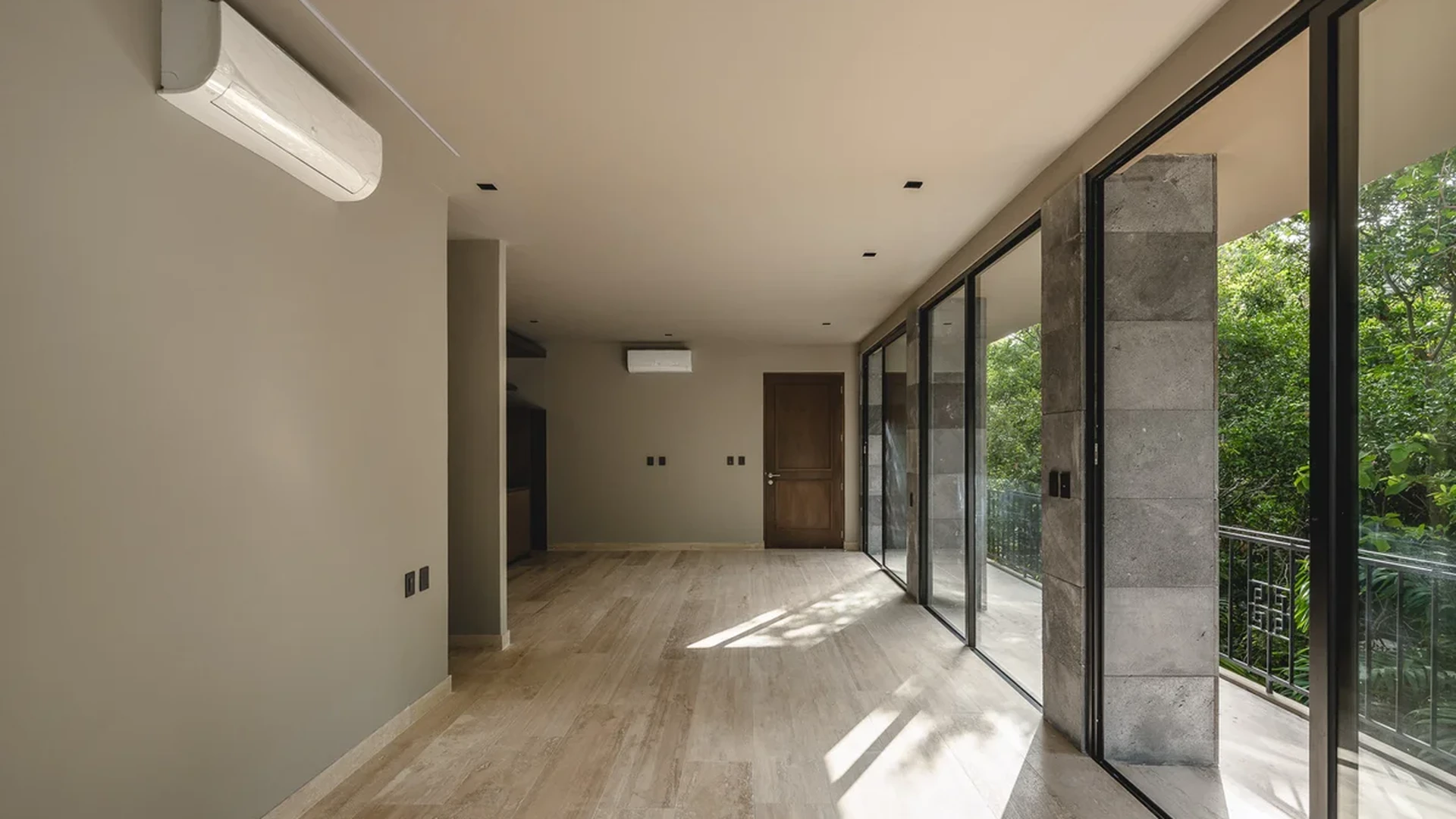 View of Spacious Room at Arthouse, showcasing Natural Light, Travertine Flooring.