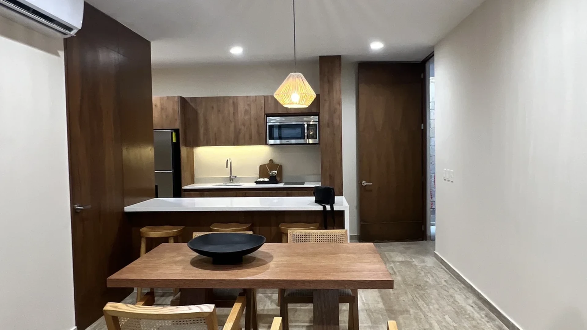 View of Open Concept Living at Constelada, showcasing Dining Area, Modern Kitchen.