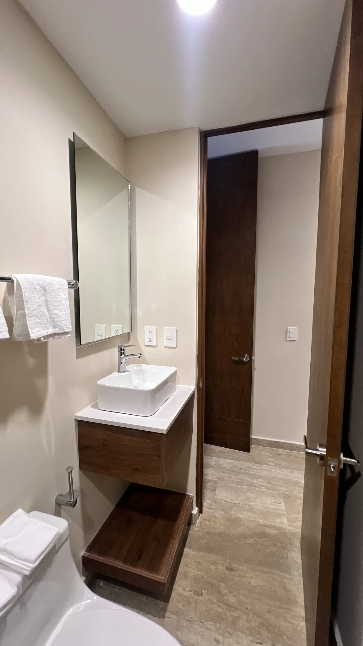 View of Modern Bathroom at Constelada, showcasing Powder Room, Floating Vanity.