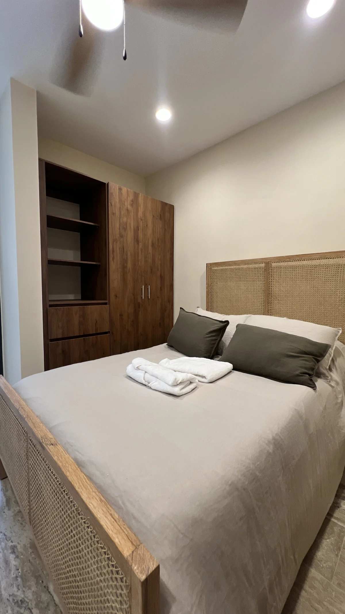 View of Bedroom at Constelada, showcasing Modern Bedroom, Rattan Furniture.