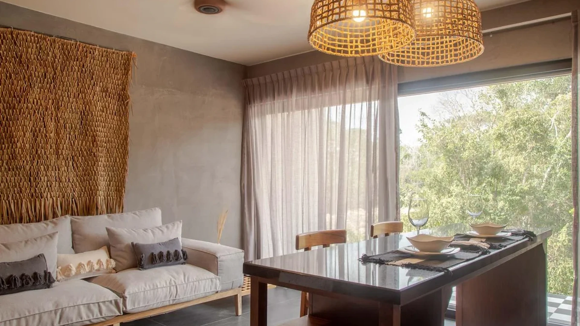 View of Open Concept Living at Hoja Santa, showcasing Bohemian Decor, Natural Light.
