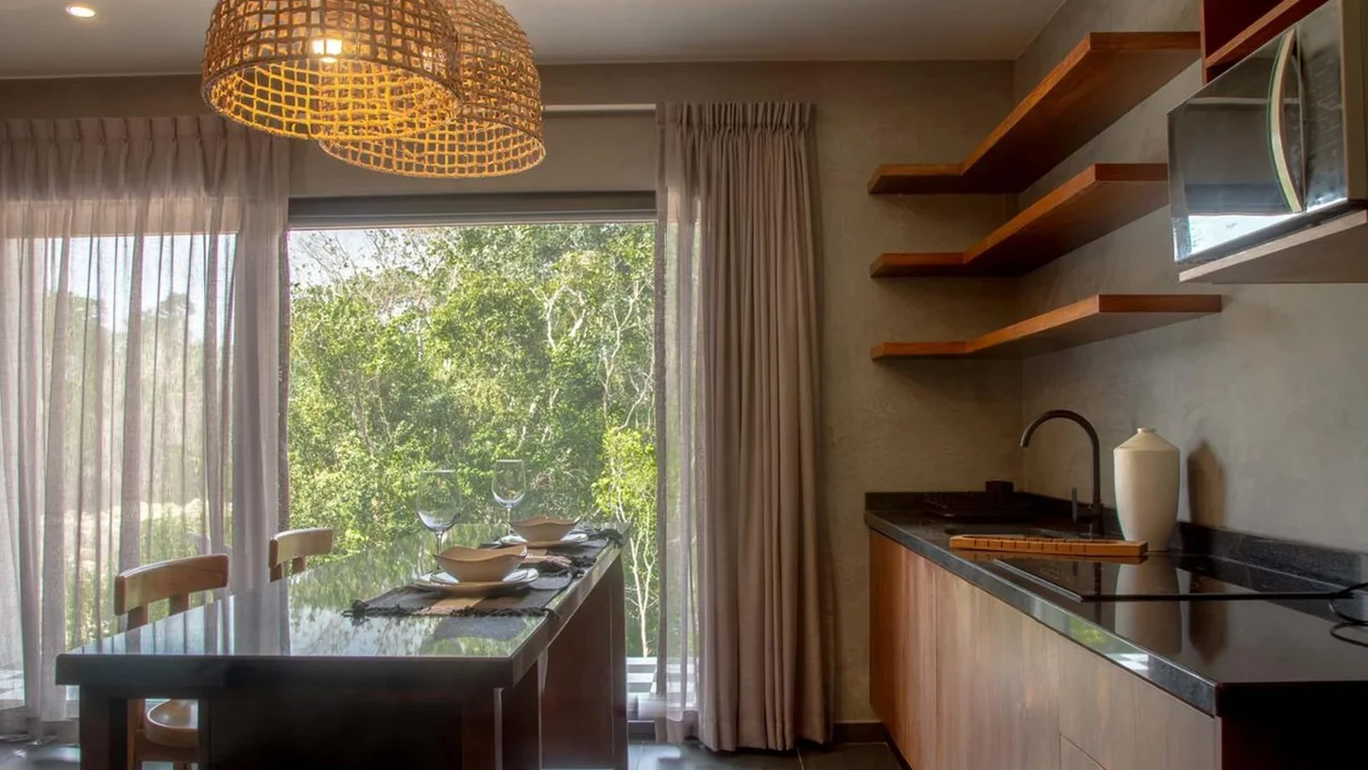 View of Modern Kitchenette at Hoja Santa, showcasing Dining Area, Jungle View.